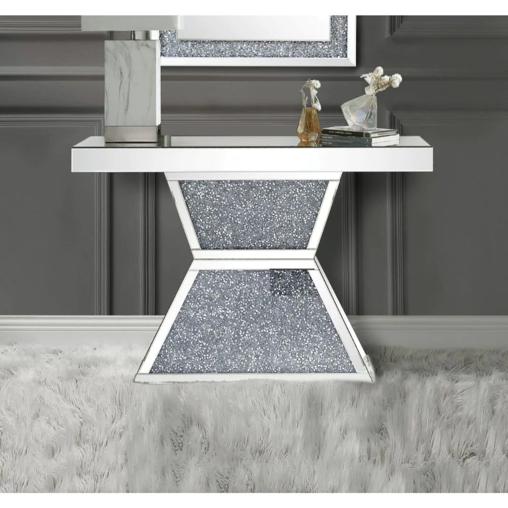 a mirrored table with a mirror on top of it